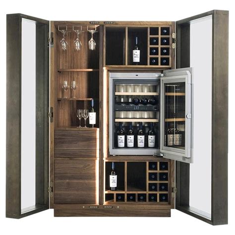 This modern wine storage solution comes in multiple styles and finishes that complement any home decor. Contemporary Italian Wine Storage Cabinet in Solid Walnut ...
