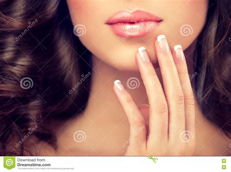 Close Up Image Of Womans Fingers And Lips Stock Photo Image Of