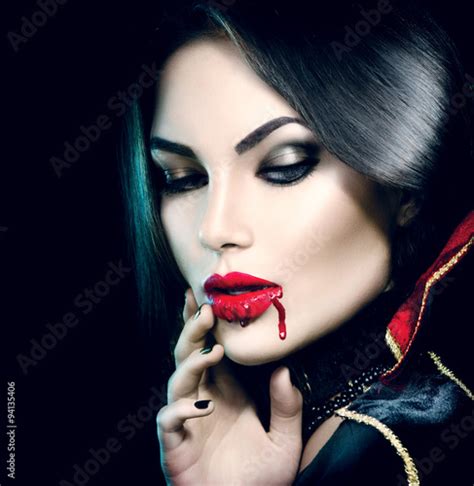 Beauty Sexy Vampire Girl With Dripping Blood On Her Mouth Stockfotos