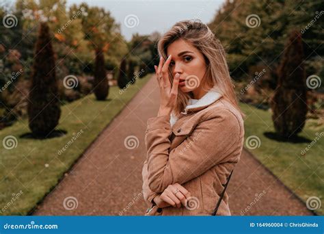 Portrait Charming Young Woman With Blonde Hair Street Style Stock