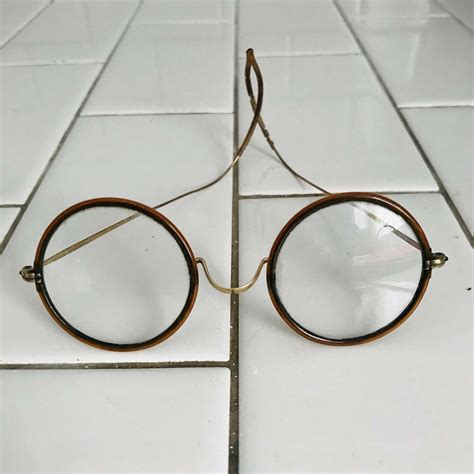 antique granny glasses eyewear mustard color bakelite rims wire bows farmhouse office