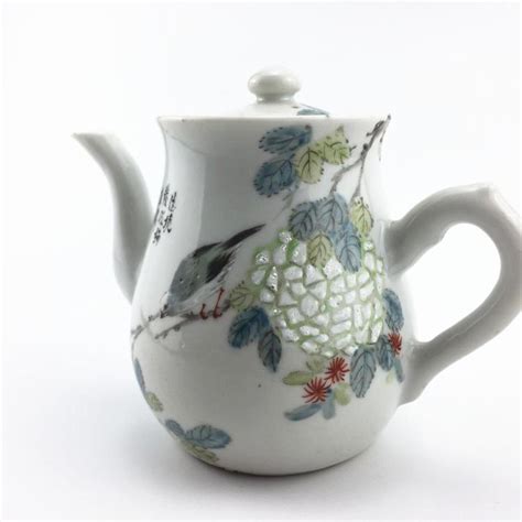 Two korean teapots 20th century, one decorated with figures and the other with sea life, figural. Sold Price: Antique Chinese Famille Rose Porcelain Teapot ...