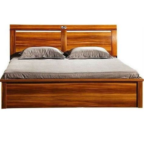 The first one on the list is this contemporary looking new wooden bed that looks just exquisite. Modern Brown Teak Wood Fancy Wooden Bed, Size: 6x6.5 Feet, Rs 25000 /piece | ID: 11253634712