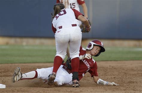 Oklahoma S Brianna Turang Right Grimaces As She Is Tagged Out At