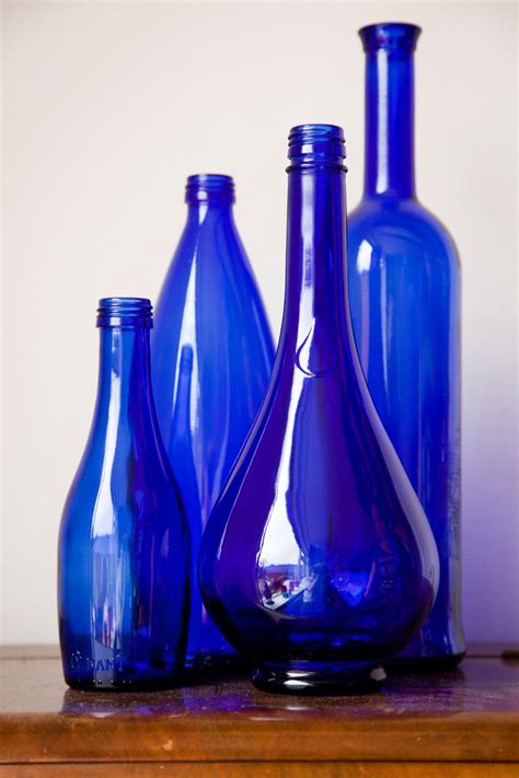 Set Of 4 Cobalt Blue Bottlesvases Blue Bottle Bottle Vase Blue Glass