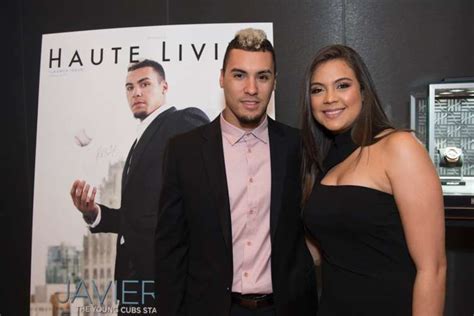 9 pendant around his neck and sweet shades similar to ones baez often wears while posing for a group photo with javy. Inside Haute Living's Chicago Launch Dinner With Javier Baez