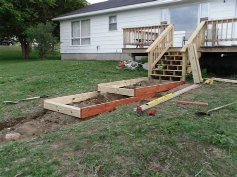 Outdoor stair landing stair colimacon staircase cast iron rails. How To Build Steps On A Slope