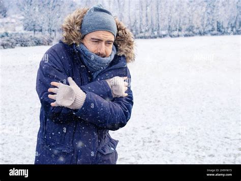 One Man Suffering And Shivering Because Of Cold Weather Stock Photo Alamy