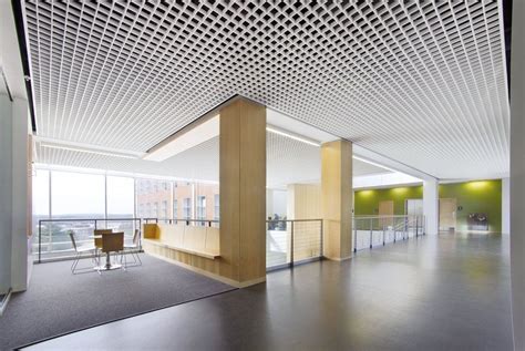 A ceiling is part of a building that encloses a space and is exposed overhead. amazing office space ceiling | Ceiling design, False ...