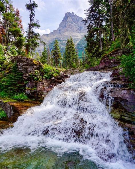 One Of The Many Stunning Waterfalls In Glacier National Park Mt Oc