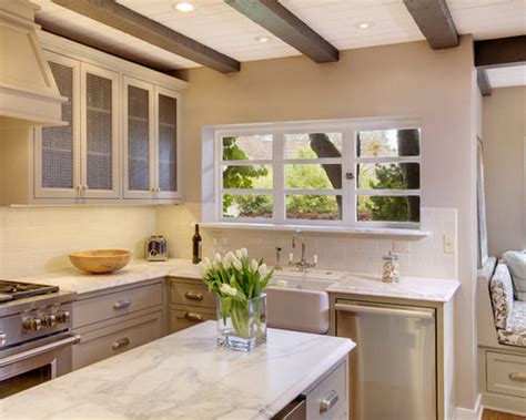 If the ceiling height of your kitchen is nine or ten feet, the cabinetry can be treated one of two ways: Low Ceiling Kitchen | Houzz