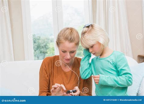 Happy Mother And Daughter Listening To Music Stock Photo Image Of