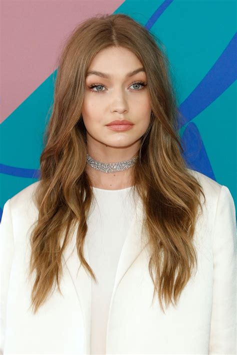 All information and material found on this site is for entertainment purposes. Gigi Hadid With Brown Hair | Gigi Hadid's Best Beauty Looks | POPSUGAR Beauty Photo 8