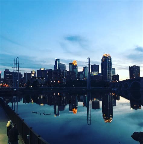 Minneapolis Skyline Reflecting Off The Mississippi River Rminneapolis