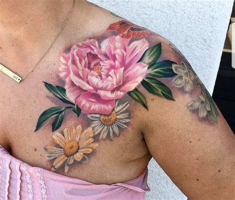 A Womans Chest With Flowers On It