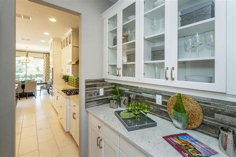 Multi family kitchen cabinets florida. MI Homes Model Home at Rivera Bella in Debary, Orlando, FL ...