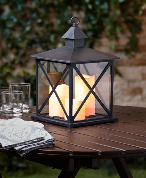 The Outdoor Triple Candle Lantern With Timer Brings Realistic