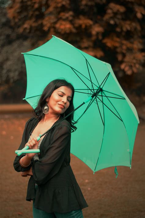 Woman Holding Umbrella · Free Stock Photo