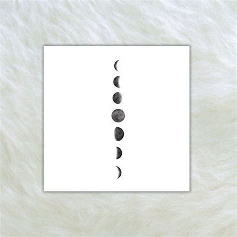 Three Phases Of The Moon In Black Ink On White Fur With Space For Your Text