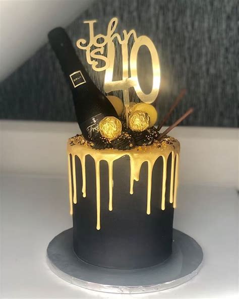 Black And Gold Drip Cake For Johns 40th Birthday Topped With Ferrero