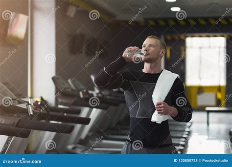 Male Bodybuilder Drinking Water After Workout Stock Image Image Of