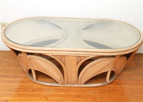 Let's start with some basics, shall we? Art Deco Style Oval Rattan and Glass Coffee Table | EBTH