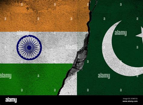 Concept Of The Conflict Between India And Pakistan With Painted Flags