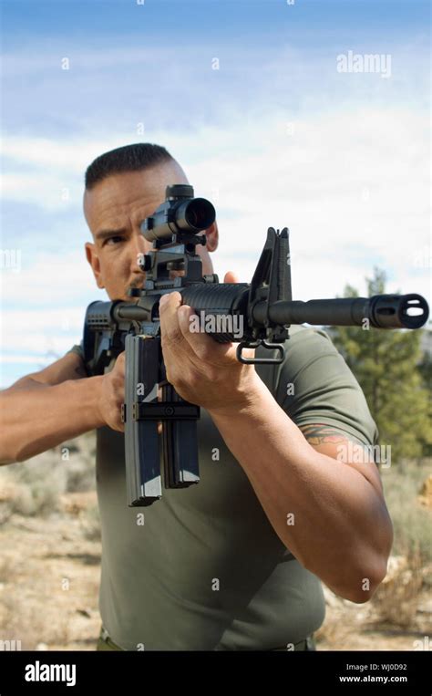 Soldier Aiming Machine Gun Stock Photo Alamy