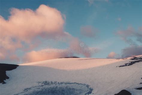 Evening Dramatic Minimal Landscape With Sunlit High Snow Mountain Top