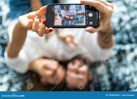Morning Selfie Young Happy Beautiful Couple On The Bed Making Self Portrait By Smartphone And