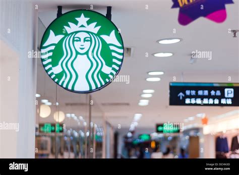 Starbucks Coffee Sign In Avenue Stock Photo Alamy