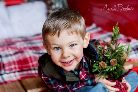 Cute Little Boy Christmas Mini Session In The Bed Of An Old Vintage Red
