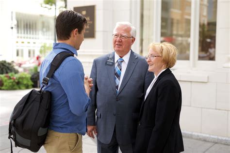 Missionary Couple Talking With A Man