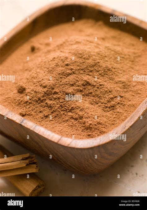 Ground Cinnamon Powder With Cinnamon Bark Stock Photo Alamy
