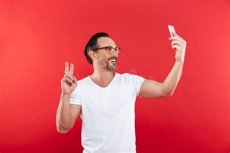Portrait Of A Cheerful Mature Man Taking A Selfie Stock Image Image Of Looking Mature 115307101