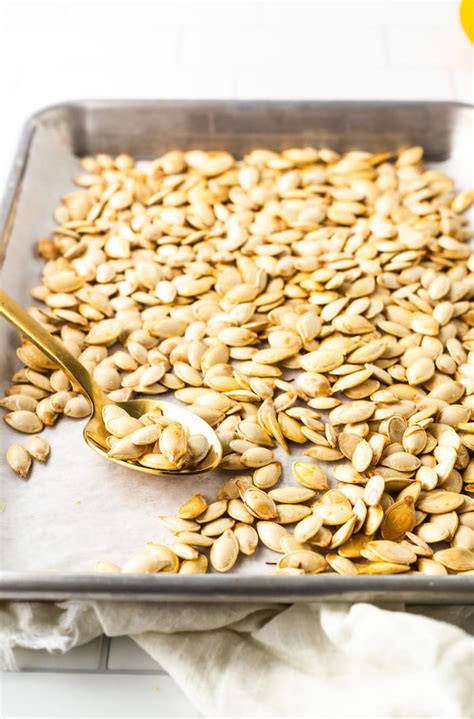 Learn how to roast pumpkin seeds and use them to make delicious autumnal snacks, salads and bakes. Roasted Pumpkin Seeds | Eating Bird Food