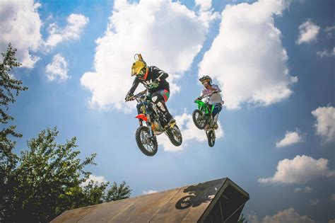Two Crazy Jumping Pitbikers Free Stock Photo Picjumbo