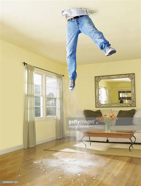 Man Falling Through Ceiling Of House Stock Photo Getty Images Latest