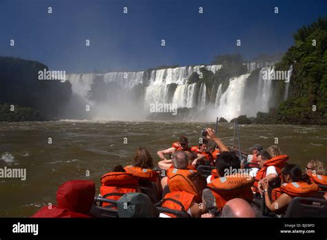 Tourist Boat Ride Under The Falls Iguazu Falls Argentina Hi Res Stock