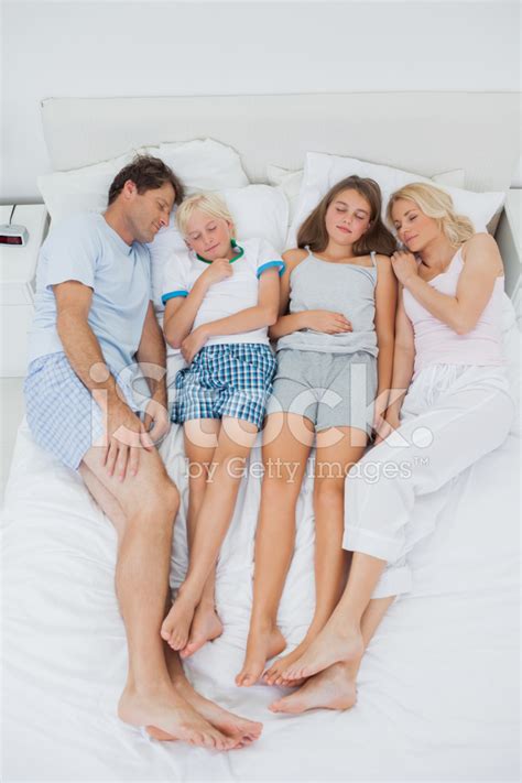 Parents Sleeping With Their Children Stock Photo Royalty Free