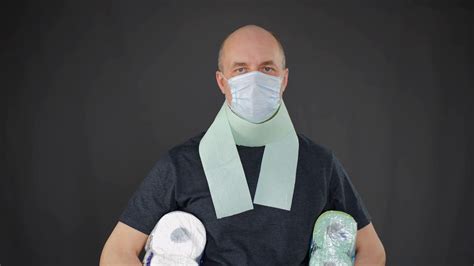 Adult Man Portrait In Protective Mask On Face Holding Toilet Paper Under Armpits Man Wearing