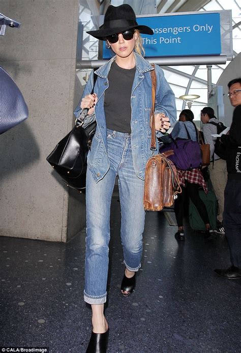Amber Heard Shows Off Her Leggy Figure In Jeans And Matching Jacket At