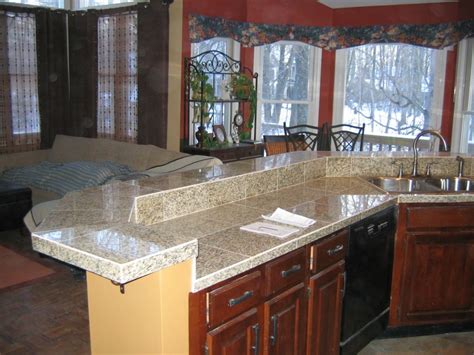 Once upon a time, standard bathroom countertops were either ceramic tile, plastic laminate, or a material that was regarded as somewhat innovative for the granite: Granite Tile Countertops Without Grout Lines | Tile ...