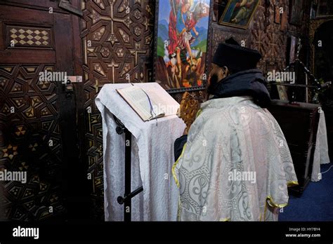 Ethiopian Orthodox Priests And Monks Praying Inside The Coptic Chapel