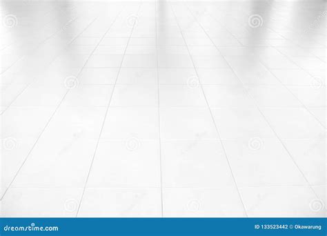 White Ceramic Floor Tiles For The Decoration Of The Bedroom Stock Photo