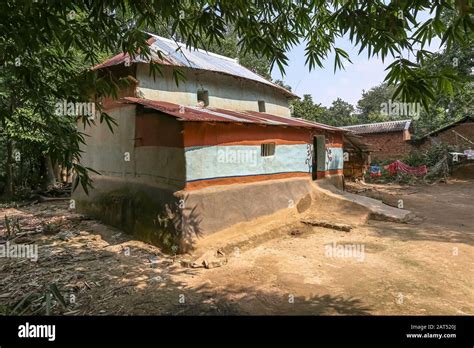 Rural Indian Village With View Of Mud Hut With Thatched Roof At Bolpur