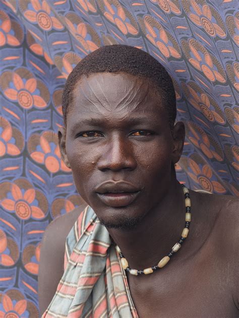 The scars on the forehead represent the rite of passage to… | Flickr