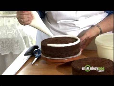 How to decorate a cake with buttercre. How to Bake and Decorate a Cake - YouTube
