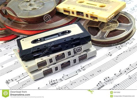 Find images of cassette tape. Old Cassette And Tapes With Music Notes Stock Photo - Image: 59916382