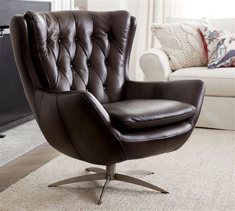A leather swivel armchair will provide help to to take care of a number of duties throughout you when you work with your computer or your pill. Wells Tufted Leather Swivel Armchair | Pottery Barn
